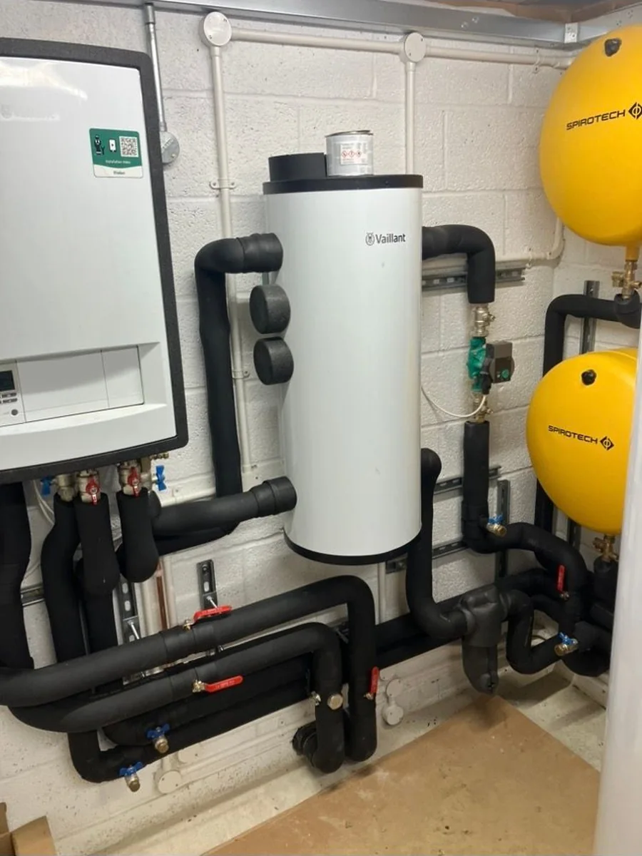Heat pump plant room with a Vaillant buffer cylinder and two Spirotech expansion vessels