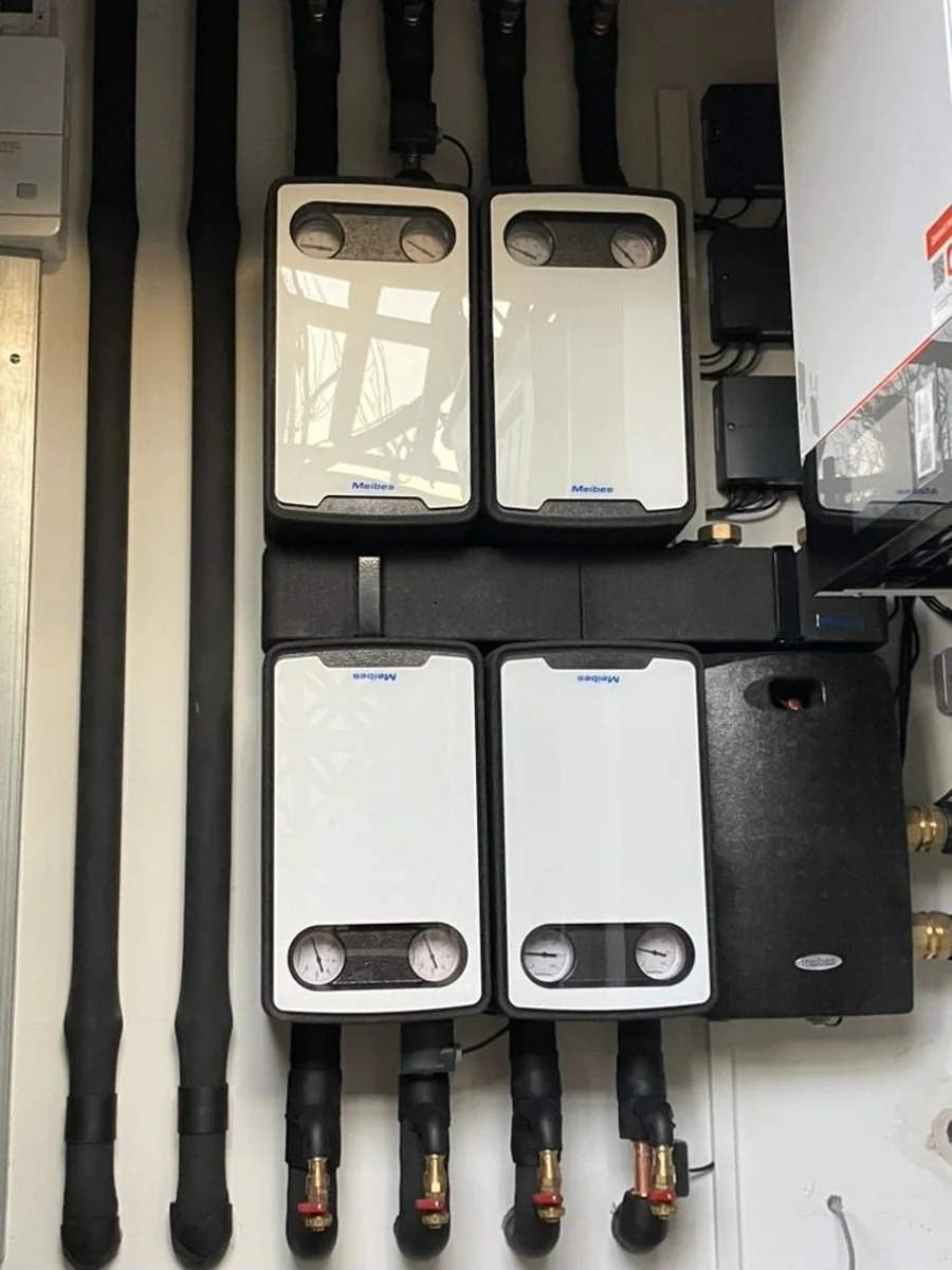 Meibes pre-insulated pump and mixing modules fitted to a heating system wall