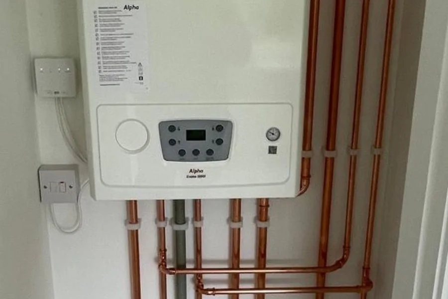 Alpha combi boiler installed with polished copper pipework by Aspie Plumbing & Heating
